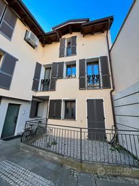 Bilocale 75 mq arredato con posto auto e giardino