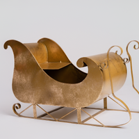 ✨ Slittino natalizio in metallo dorato