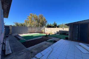 Appartamento con giardino e posto auto