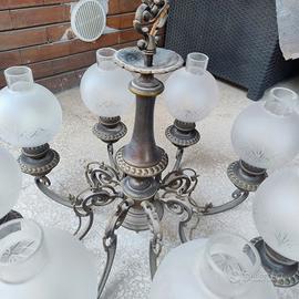 lampadario in ottone con campane in vetro 