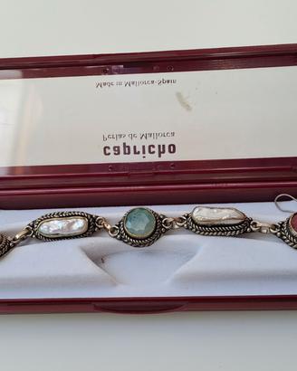 Bracciale e orecchini in argento con perle pietre