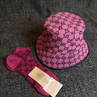 Cappello e calzino Gucci