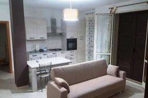 Bilocale con grande terrazza e garage