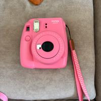 Polaroid rosa con cover