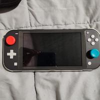 nintendo switch lite + custodia + 2 giochi + cover