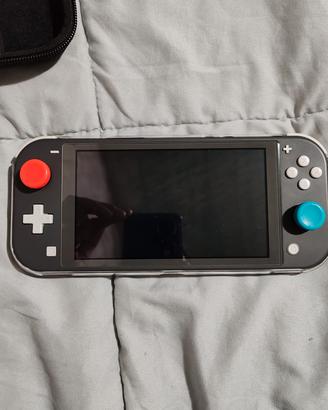 nintendo switch lite + custodia + 2 giochi + cover