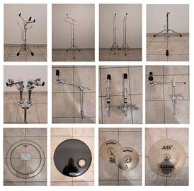 vari piatti, aste, pelli e strumentazione batteria