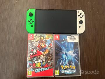 nintendo switch oled + due giochi