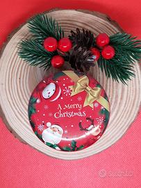 Candela natalizia profumata in contenitore