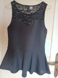Canottiera elegante di pizzo nero