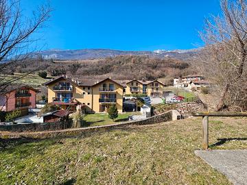 BILOCALE SEMINUOVO CON 2 BALCONI e POSTI AUTO