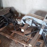 Pinza e rotore per escavatore