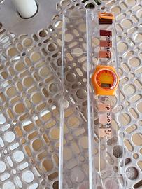 Orologio gadget vintage di Ambre Solaire (Garnier)