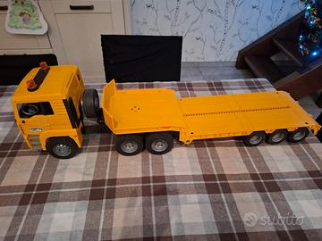 truck con rimorchio più draga