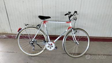 Bicicletta bianca e rossa marca CHESINI