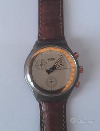 Swatch Goldfinger SCM 100