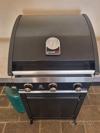 Barbecue Grandhall con fuoco laterale e pinze