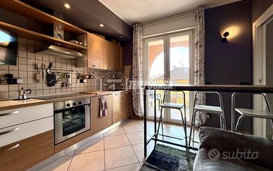 BILOCALE CON BALCONE E POSTO AUTO COPERTO