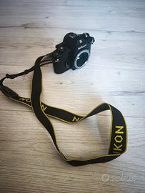 Nikon EM Reflex Vintage + 2 obiettivi + accessori 