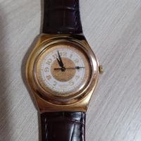 Orologio Swatch dorato