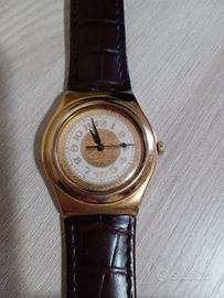 Orologio Swatch dorato