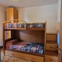 2 letti a castello +1 con scala a cassetti e  pass