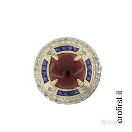 Anello in oro,argento,diamanti,zaffiri e granato