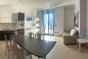 Appartamento piano terra con corte e garage