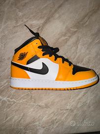 Jordan 1 mid yellow taxi