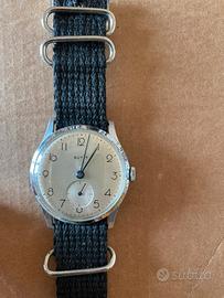 Orologio carica manuale titus /sutit  vintage