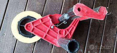 Svolgitore dispenser per imbianchino.