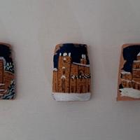 Piccole piastrelle in terracotta ornamentali 