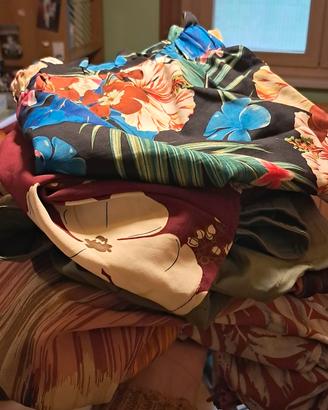 pantaloni,maglia e tuta pantaloncino tutto insieme