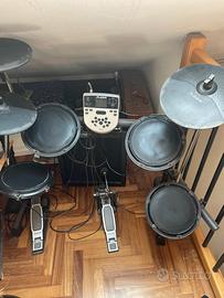 Batteria  Elettrica Alesis DM7X e Amplificatore