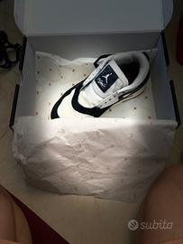 Nike Air Jordan 4RM bianche e nere