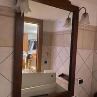 Specchio con luci per bagno.
