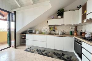 MANSARDA A GIUGLIANO IN CAMPANIA