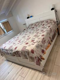 Letto matrimoniale con libreria in garanzia