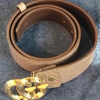 Cintura Gucci pelle goffrata fibbia GG dorata