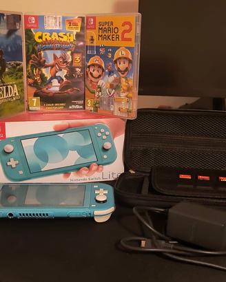 Nintendo Switch Lite + caricabatterie + 3 giochi