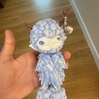 Hirono ceramic feather figurine