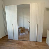 Armadio 6 ante battenti con specchio centrale