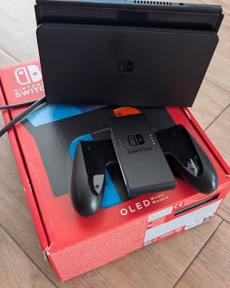 Nintendo switch OLED+Joy-Con+2 giochi come nuova