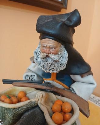 pastore sardo su asinello in terracotta