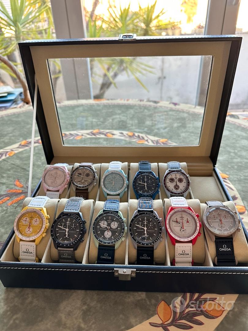 Omega Moon Swatch collezione completa 11 pianeti Abbigliamento e
