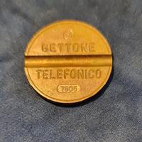 Gettone telefonico e varie monete (lire)