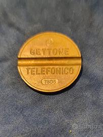 Gettone telefonico e varie monete (lire)