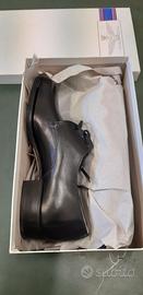 Mocassino punta tonda.