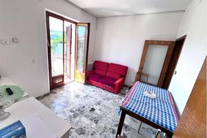 APPARTAMENTO CON SOFFITTA, AMPIO PARCHEGGIO e ORTO