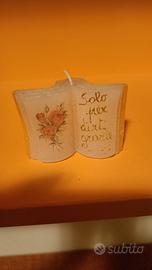 candela a forma di libro